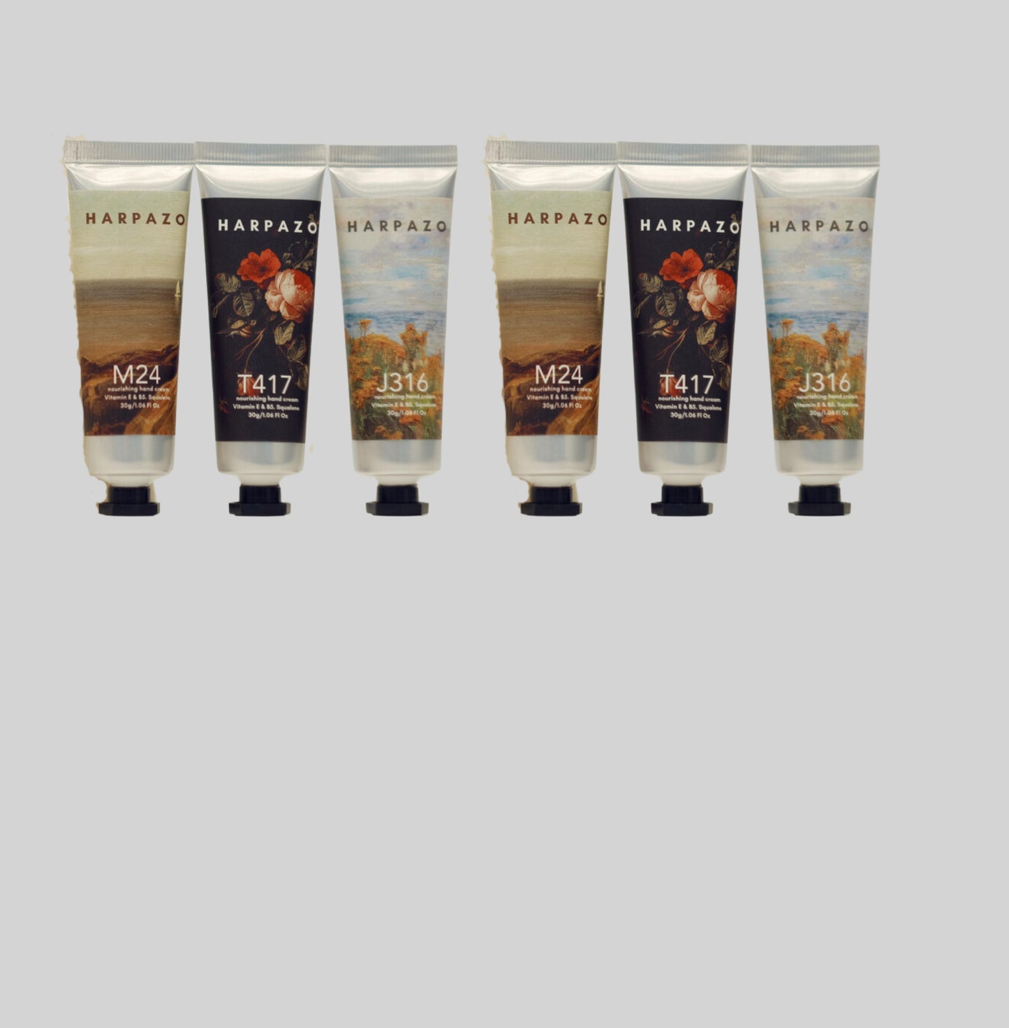 A set of six travel size hand creams with floral designs on each tube, displayed alongside a mini ribbon gift bag with the brand name 'HARPZAO'.