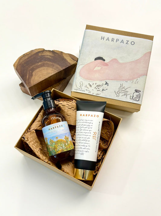 Harpazo skincare products including a bottle, tube, and soap in a box on a white background