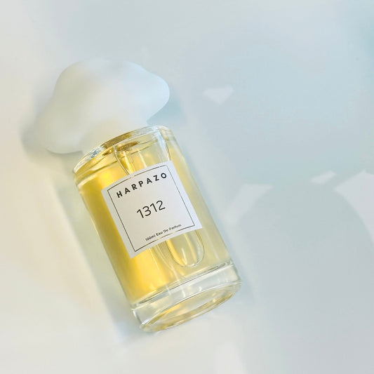 Perfume bottle with 'Harpazo' label on a light background