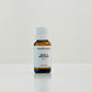 A small bottle labeled 'HARPAZO Ebony & Bergamot' on a light background.