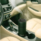 Car interior with a black car air freshener diffusing fragrance