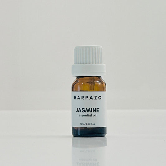 A small bottle labeled 'HARPAZO JASMINE essential oil 10ml' set against a white background.