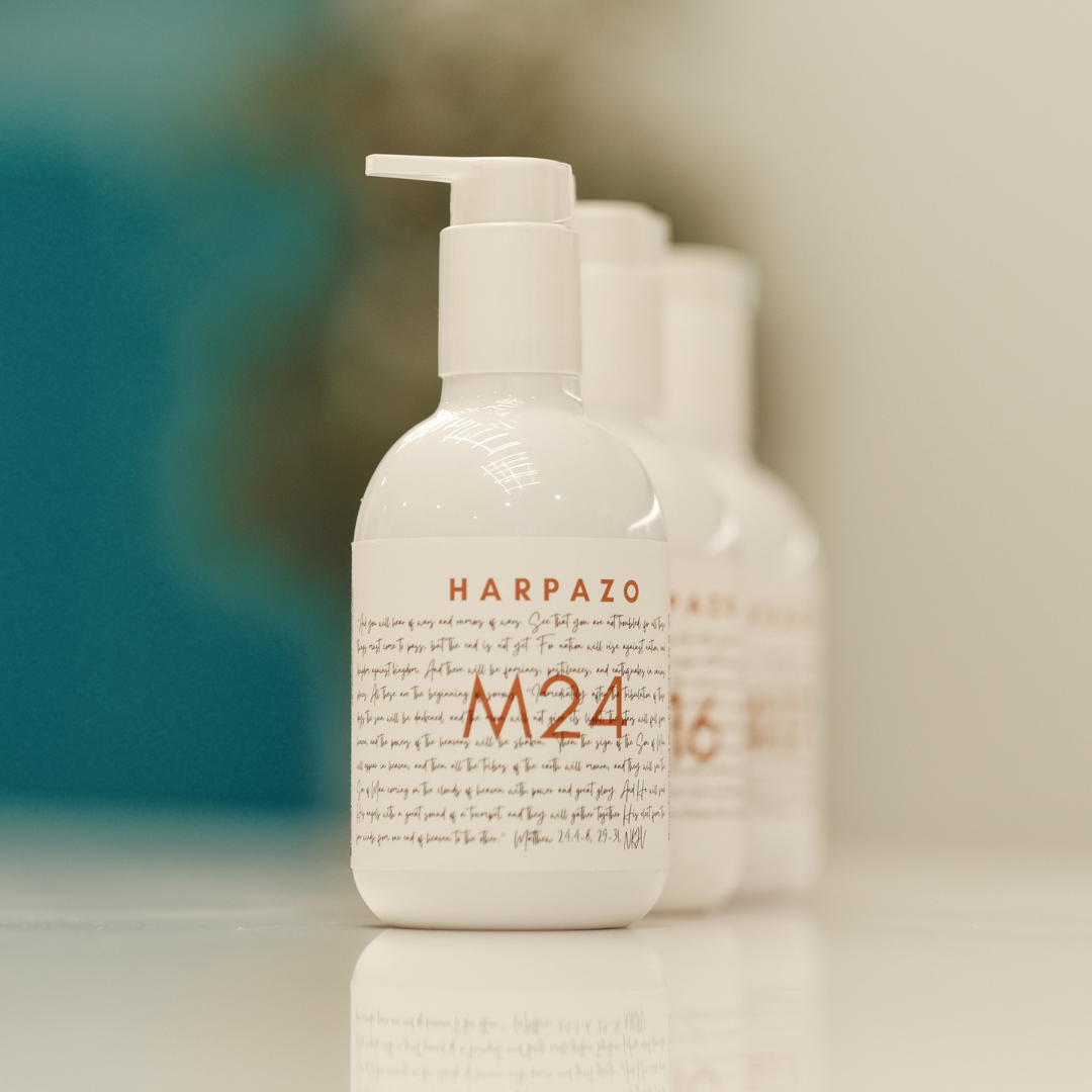 Three pump bottles of M24 hand wash in a row, with the brand name and product number visible on the labels.