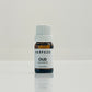A small bottle labeled 'HARPAZO OUD essential oil' with a capacity of 10ml, placed on a reflective surface against a white background.