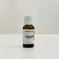 A bottle of Osmanthus Oolong diffuser oil with a white cap and label, on a white background.