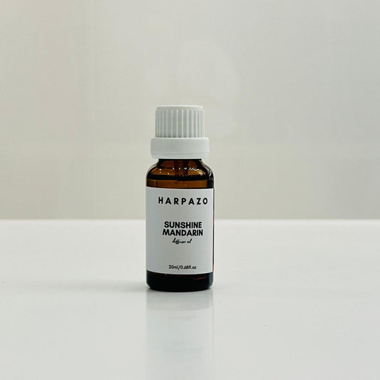 A bottle of HARPAZO Sunshine Mandarin Diffuser Oil, 20ml, with a white label on a white background.