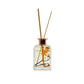 A glass reed diffuser bottle with a floral design and a rose gold cap, labeled 'HARPAZO' with the text 'SEEK AND YOU WILL FIND' on the front.